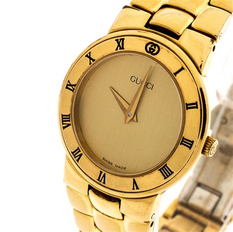 gold gucci watches for women.